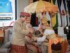 Pj. Gubernur Samsudin dan Ibu Maidawati Ikuti Prosesi Lanjutan Pemberian Gelar Adat oleh Majelis Penyimbang Adat Lampung di Mahan Agung